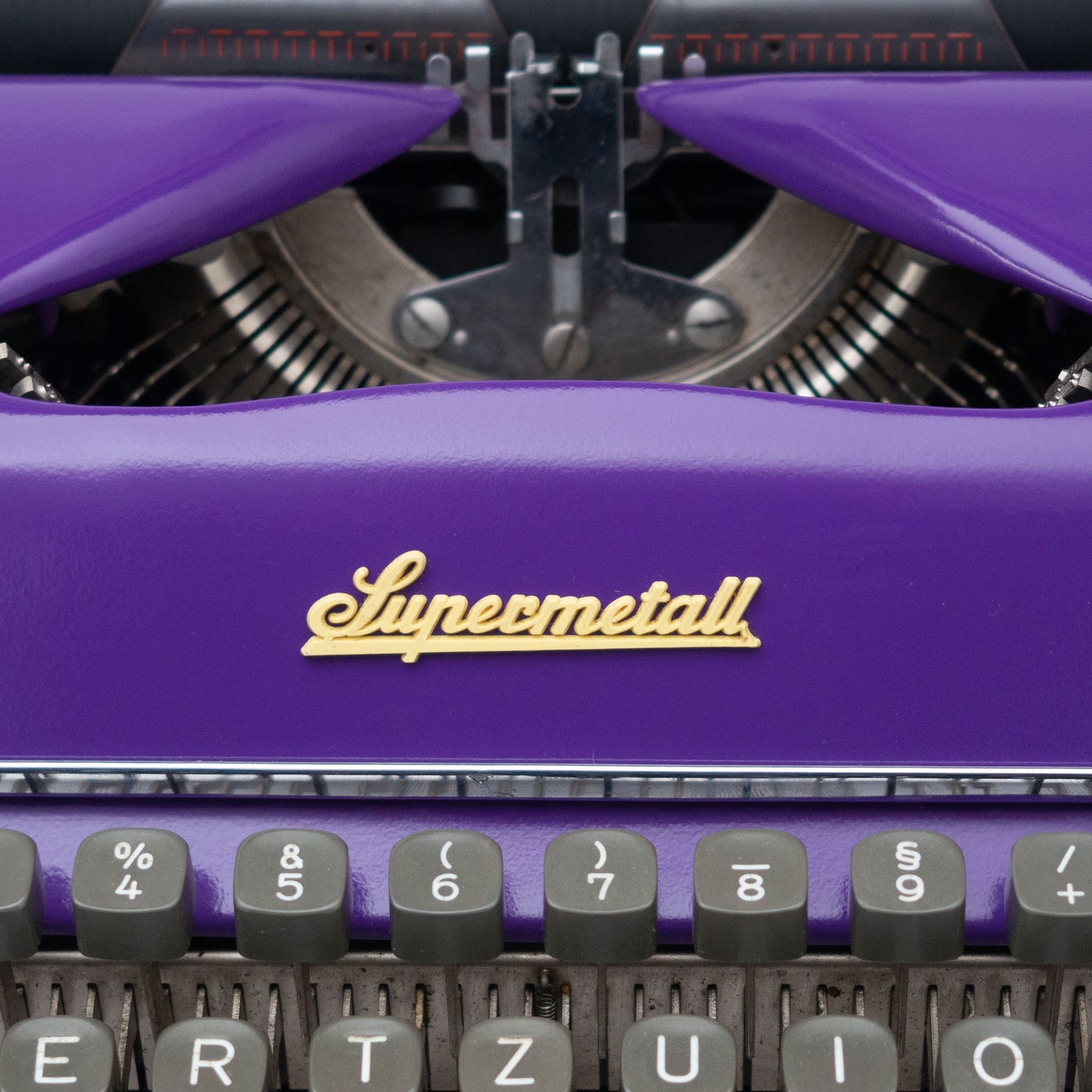 Lila Schreibmaschine Supermetall